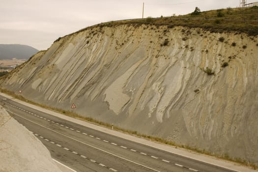 Clay hill and Road in the spanish countryside