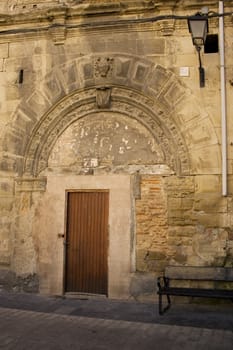 Old door in the spanish street in Los arcos