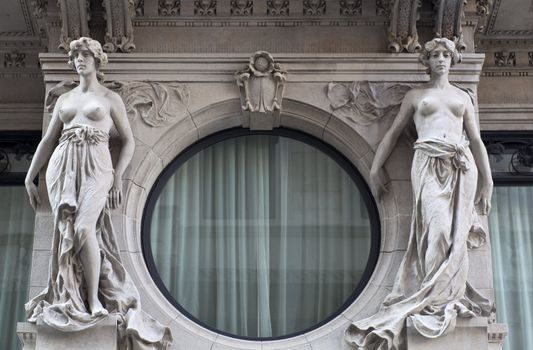 Women statues on a building, Trieste - Italy
