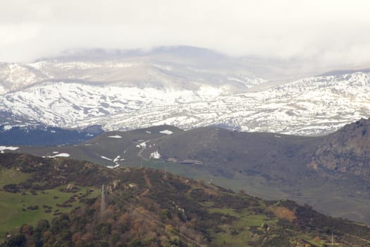 View of Monti Nebrodi with snow and clouds