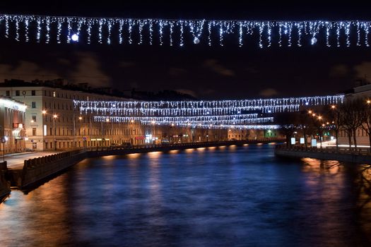 Night Christmas view of Fontanka river. St. Petersburg, Russia