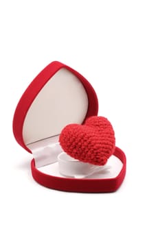 Red Heart in Red Velvet Luxury Gift Box on White Background using as Love Valentine Concept