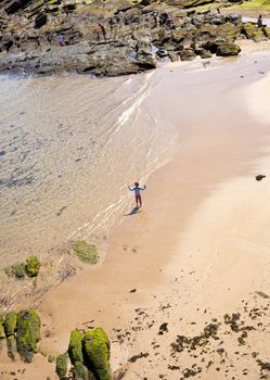 Children play in the Santander beach