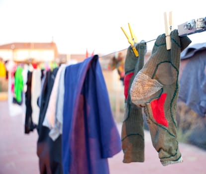 Green socks hung out to dry