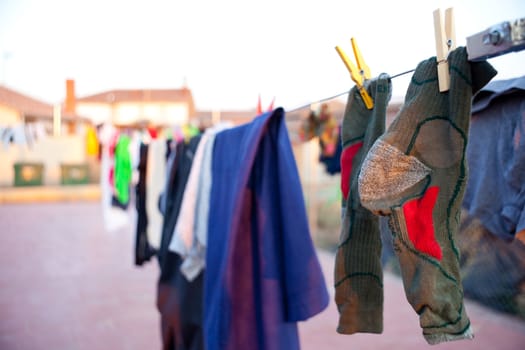 Green socks hung out to dry