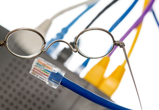 Close macro focus on internet lan cat5 cables as concept for cyberwarfare