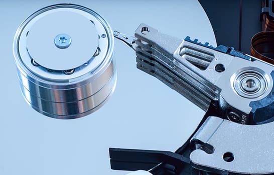 Hard disk detail with a blue hue to accentuate the coldness of technology