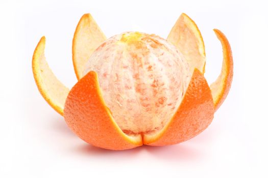 The fresh orange cleared of a peel 