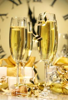 Glasses of champagne ready to celebrate at the stroke of midnight New Years Eve