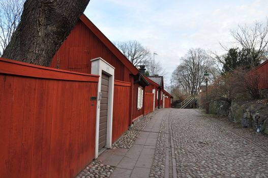 A cobbled street with old buildings in Stockholm.