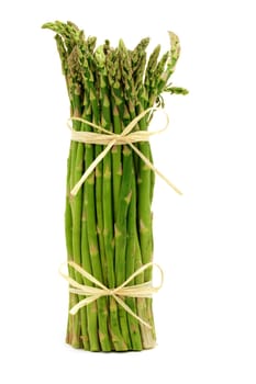 Green asparagus bundle on white background