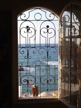 Gateway to the sea ocean view - the Mediterranean through an open window