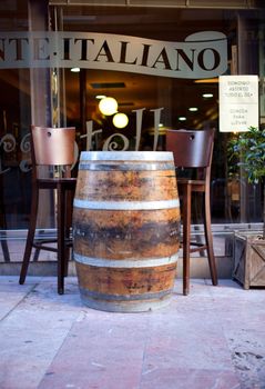 Barrel used as a table in a bar