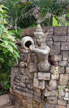 old scultpure and decorative work in wall in thailand