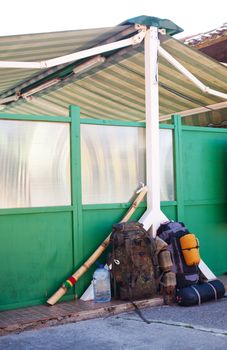 Two backpacks and a didgeridoo