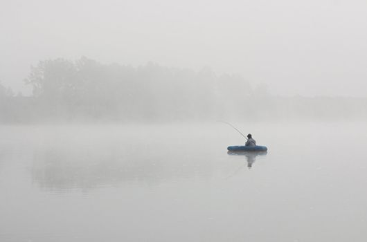 Fishing on the river in the early morning