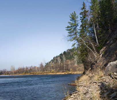 Fishing on the mountain river with fast current