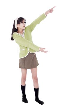 Asian biracial girl in green sweater pointing to something off to the side, isolated