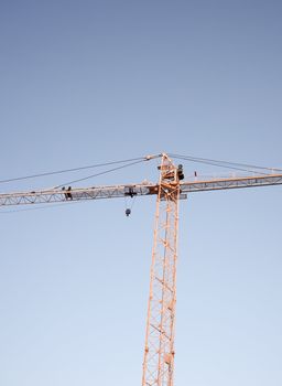 Crane on the blue sky