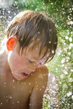 Young child playing in the water