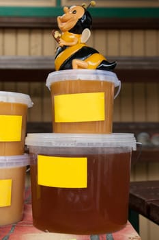 honey in  bowls for sale on the farmer market