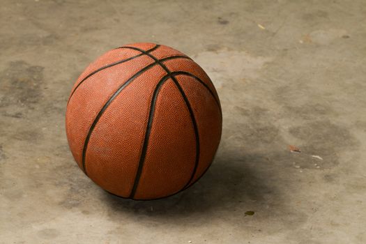 basketball on a cement floor