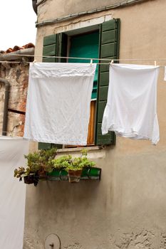 White laundry hanging to dry on a clothes-line