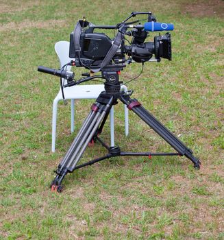 Digital movie camera on a set in the park
