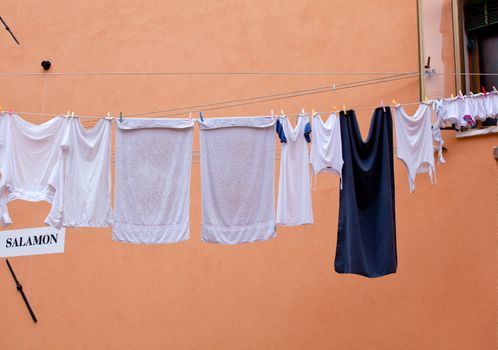 White laundry hanging to dry on a clothes-line.