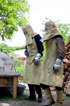 Workers during the Glass processing - Hot melting glasses