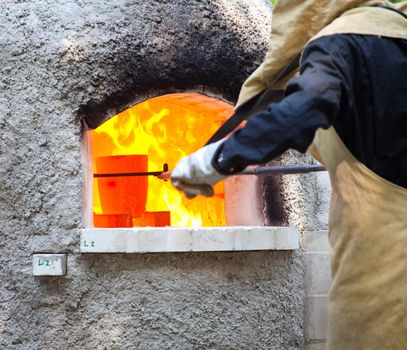 Workers during the Glass processing - Hot melting glasses