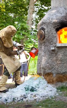 Workers during the Glass processing - Hot melting glasses