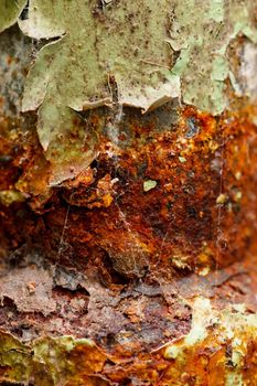 Macro view of rusty metal with peeling paint