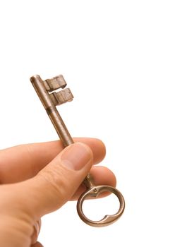 Hand and key isolated on white background