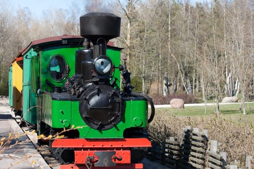 Old retro colorfull little steam train