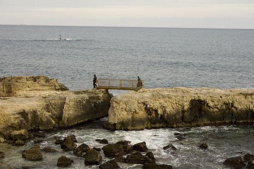 Walkway on the rocks in Ortigia sea, Syracuse - Sicily