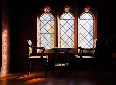 interior room design of study with stained glass and leaded windows, moody hues with crop margins and empty negative cop space