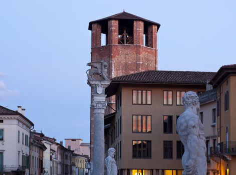Winged lion and Ercole statue in Piazza Libertà, Udine - Italy