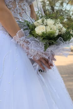 Beauty bouquet in a hands of the bride