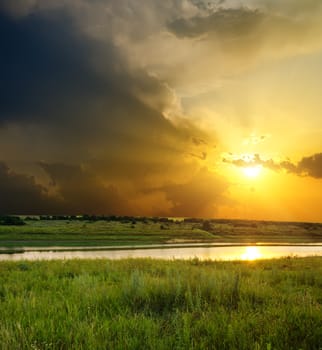 sunset over river