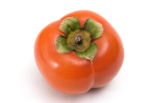 ripe persimmon - isolated on white background