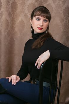 Portrait of a young girl in a black blouse