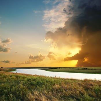 Golden sunset over river