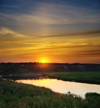 sunset over river