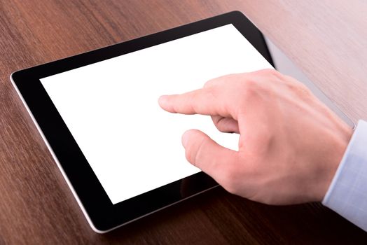 hand on a touch screen of tablet pc, with clipping path