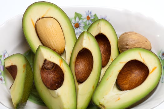 Fresh Avocado Halves On Plate