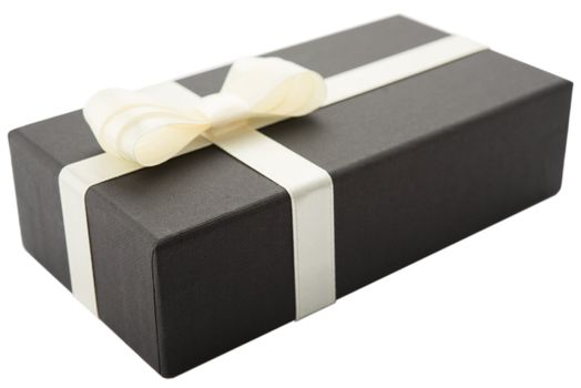 Black gift box with white bow, isolated on white background