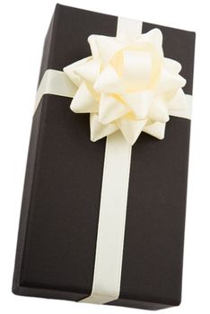 Black gift box with white bow, isolated on white background