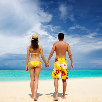 Couple on a tropical beach at Maldives