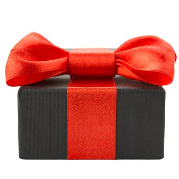 Black gift box with red bow, isolated on white background